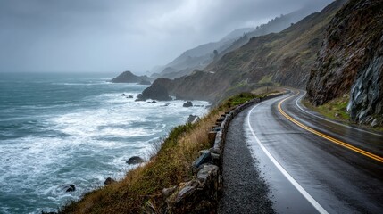 Dramatic coastal road with ocean waves and rugged cliffs on a stormy day