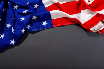 Overhead view of crumpled america flag fabric with stars and stripes by copy space