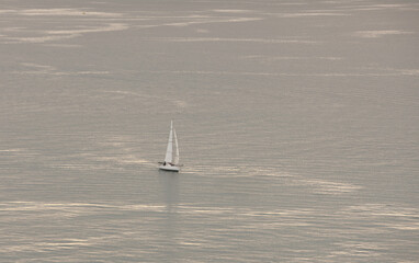 sailboat off Naples at dawn