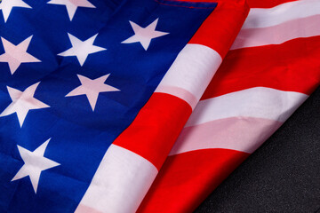Stars and stripes arranged together on a surface during a national celebration or event with patriotic themes and symbolism
