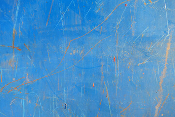 Rusted scratched grungy metal sheet texture.