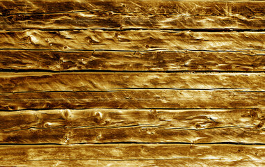 Weathered old wooden log house wall texture.