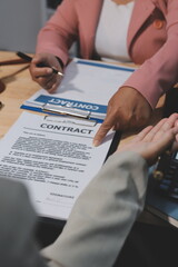 Consultation and conference of professional businesswoman and Male lawyers working and discussion having at law firm in office. Concepts of law, Judge gavel with scales of justice