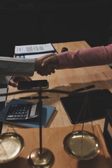 Consultation and conference of professional businesswoman and Male lawyers working and discussion having at law firm in office. Concepts of law, Judge gavel with scales of justice