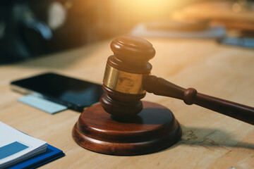 Consultation and conference of professional businesswoman and Male lawyers working and discussion having at law firm in office. Concepts of law, Judge gavel with scales of justice