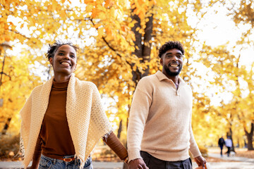  Couple Holding Hands in Autumn Park