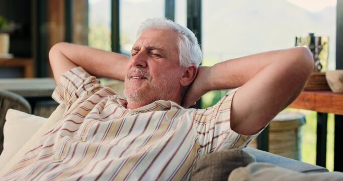 Thinking, stretching or senior man on sofa in home for chilling, comfortable or enjoy calm on afternoon. Retirement, morning and elderly person on couch for resting, lazy and peaceful in living room
