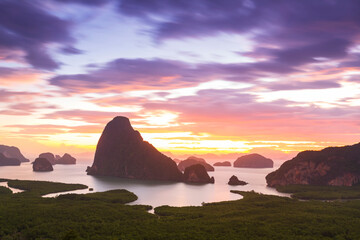 Long exposure of Vibrant Sunrise Over Majestic Karst Islands at Samet Nang Chee viewpoint in Phang Nga Bay, Phang Nga province, Southern of Thailand 