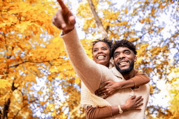 African American Couple Sharing Loving Autumn Moment in the Park