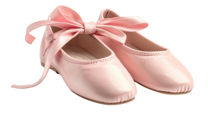 Two ballet flats with a large pink bow, isolated on black