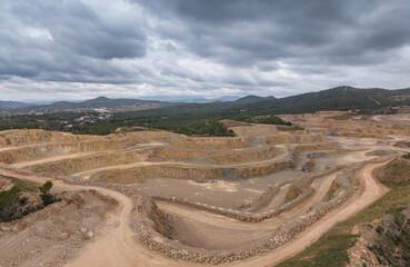Aerial view of the Salt del Llop quarry in Sagunto showing the environmental impact of open-pit mining