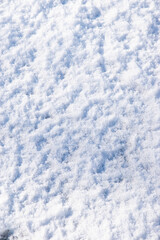 Fototapeta premium Sol enneigé uniforme, vue de haut