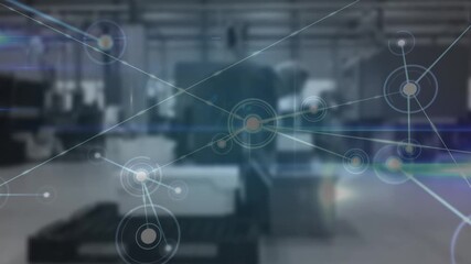 Animation of network of connections over blurred warehouse - Powered by Adobe