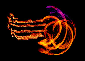 a long-exposure photograph of a fire performance, where a skilled performer spins flaming props like poi to create mesmerizing light trails and intricate patterns against the dark background