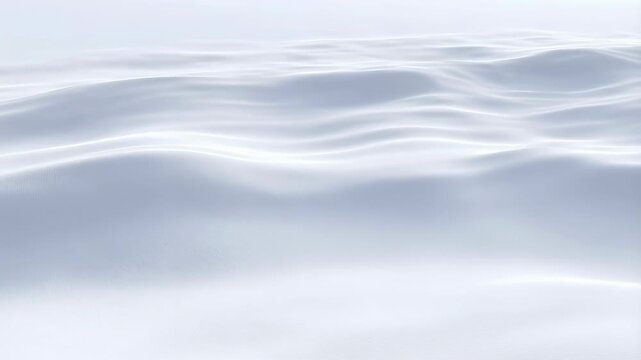 Serene white waves gently undulating in a tranquil ocean setting. Represents calmness, peace, and the beauty of nature's fluidity