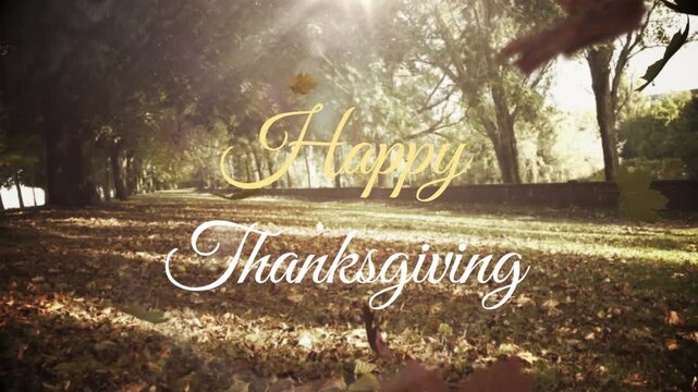 Animation of happy thanksgiving text with autumn leaves over trees in park