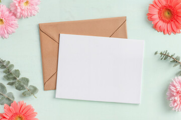 Mockup for Mother's Day greeting card with flowers and envelope