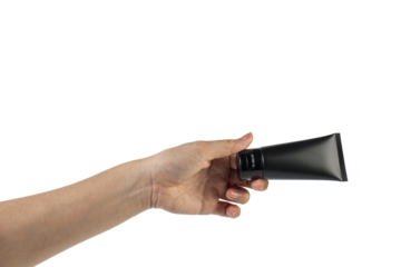 Black cosmetic product or sunscreen cosmetic with hand on transparent background.