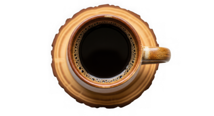 Overhead view of a ceramic mug filled with hot black coffee on a wooden coaster  isolated on transparent background
