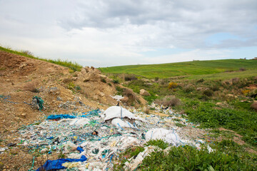 shredded and pressed recyclable plastic waste that has been burned and causes environmental pollution.