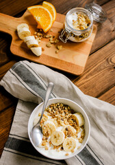 healthy breakfast bowl of yogurt with granola and eggs