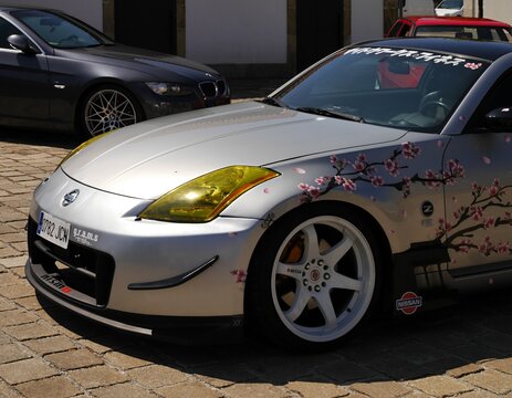 Nissan 350Z sports car with cherry blossom decals