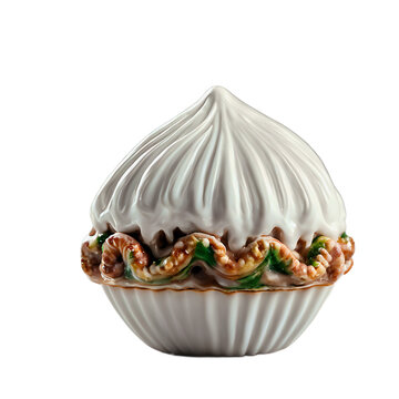 A small porcelain feve from king cake isolated on a empty plain background