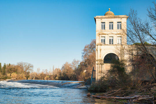 The old mill in Bagnols, B&eacute;ziers, France. It is located on the banks of the Orb River. It supplied water to the town, which is situated on higher ground. In the south of France, in Occitania.