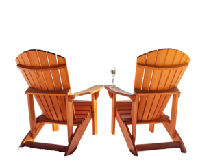 Two chairs in the sun during winter, with a view of the mountains, champagne in hand