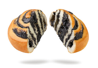 Poppy seed bun cut in half flies on a white background. Isolated