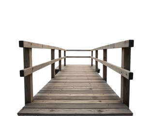 Fototapeta premium A wooden bridge spans a calm body of water, perfect for peaceful scenery or tranquil landscape photography