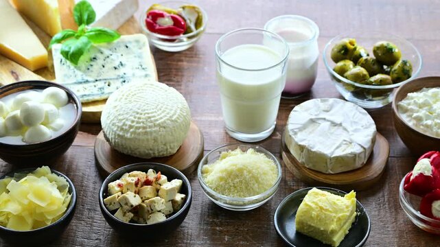 A variety of dairy products including cheese, milk and yogurt.