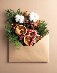 Festive Christmas Envelope with Natural Decorations and Holiday Cheer.