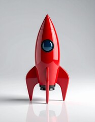 Red rocket toy ready to launch