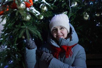 young woman with christmas tree