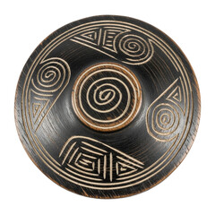 An isolated ancient ceramic bowl with intricate designs and patterns on a dark background viewed from directly above