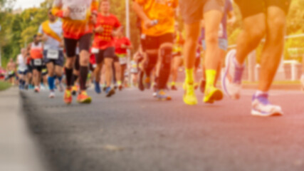 Marathon participants run on the road, mass run, sports marathon, active lifestyle, amateur sports, popularization of physical activity and healthy lifestyle. High quality photo © Антон Скрипачев