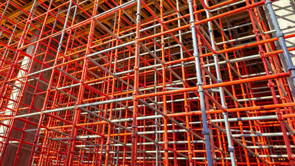 Metal construction of scaffolding, structure frame, metal construction products, auxiliary building systems, adaptability of modern structures, industrial building materials. High quality photo