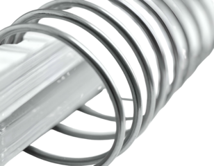 Metallic spiral binding holding together stacked sheets of paper