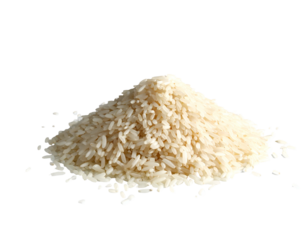 Heap of uncooked white grain piled against dark background