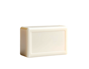 Creamy rectangular bar of soap with rounded edges on black
