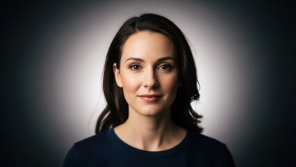 Confident Professional Woman with Dark Hair and Subtle Smile Posing for Portrait.