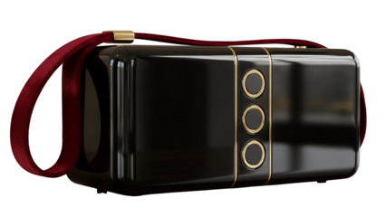 Sleek black luxury handbag with chic gold accents and deep red strap, isolated on transparent background