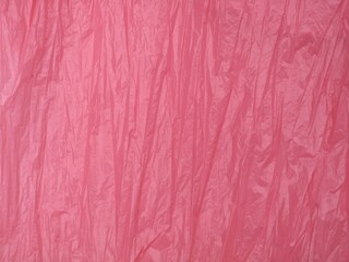 Abstract crumpled pink plastic bag texture. Suitable for background. Copy space
