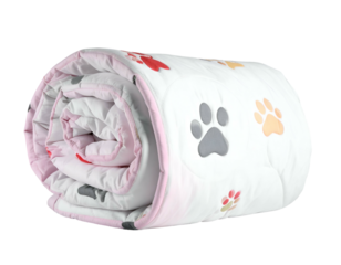 Rolled blanket with colorful paw prints and playful shapes