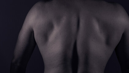 Man back shadow. Male. Photo. Strong body man. Model. Shadow. Sensual. Muscles