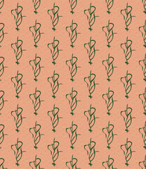 Green grass elements, star-shaped small shapes on peach background make a seamless vector pattern.