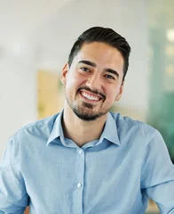 Fotobehang Sportwinkel Portrait of a young businessman having a meeting or training in the office. Teamwork and success concept, portrait of a smart young businessman, student, teacher or coach  © Lumos sp