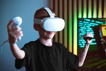 Young boy using virtual reality VR headset