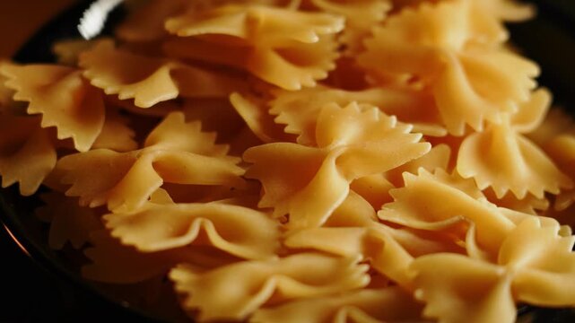 Making farfalle pasta at home in an Italian kitchen